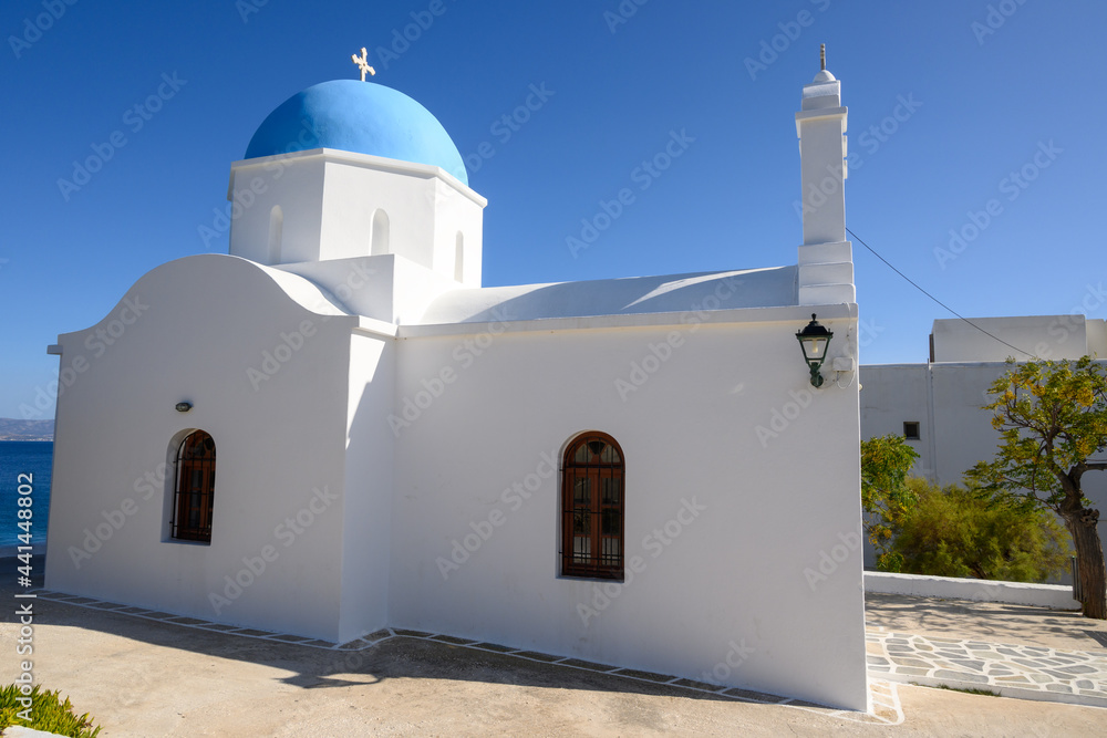 Whitewashed blue dome Greek church in Piso Livadi, Paros Island, Cyclades, Greece