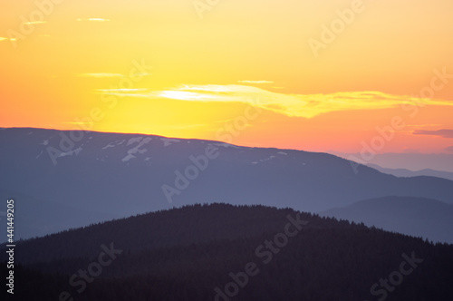 Beautiful orange sky during dusk in the carpathian mountains