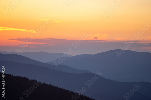 Beautiful orange sky during dusk in the carpathian mountains