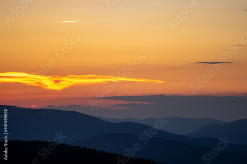 Beautiful orange sky during dusk in the carpathian mountains