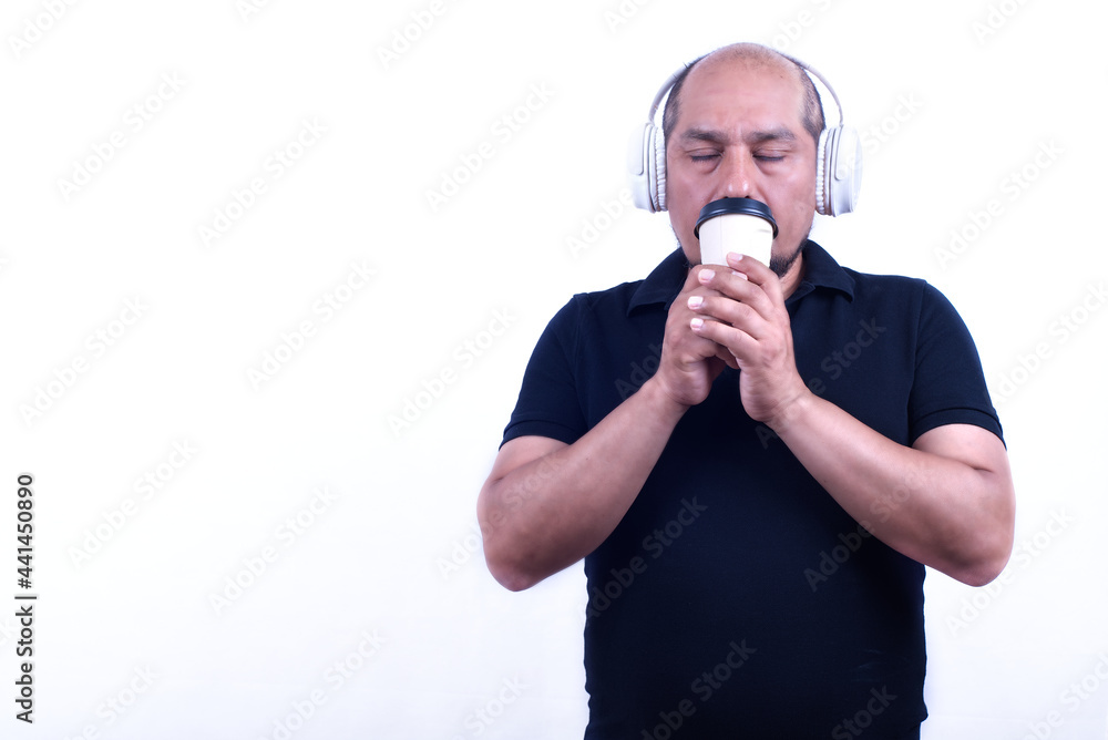 Sitting in studio of man grimacing and holding objects, on a white background. Sitting in studio of man grimacing and holding objects, on a white background.