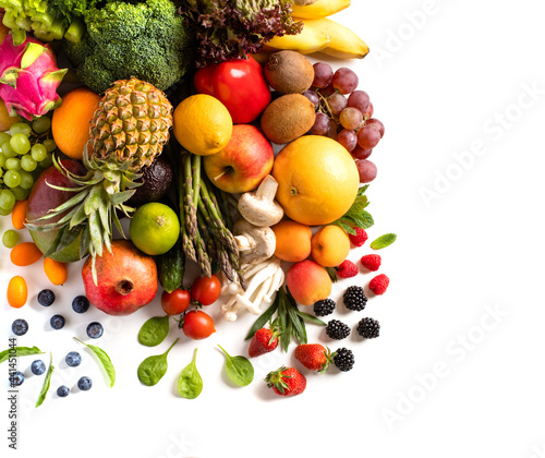 Assortment of various fresh vegetables and fruits stacked in a pile