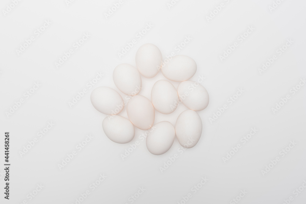 top view of raw and organic eggs isolated on white top view of raw and organic eggs isolated on white