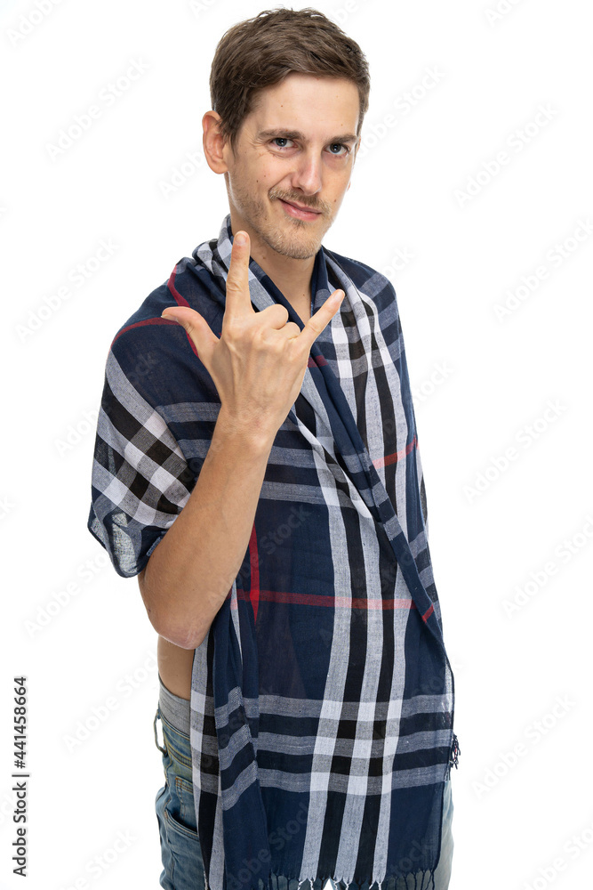 Young handsome tall slim white man with brown hair showing heavy metal sign with scarf over his body isolated on white background Young handsome tall slim white man with brown hair showing heavy metal sign with scarf over his body isolated on white background