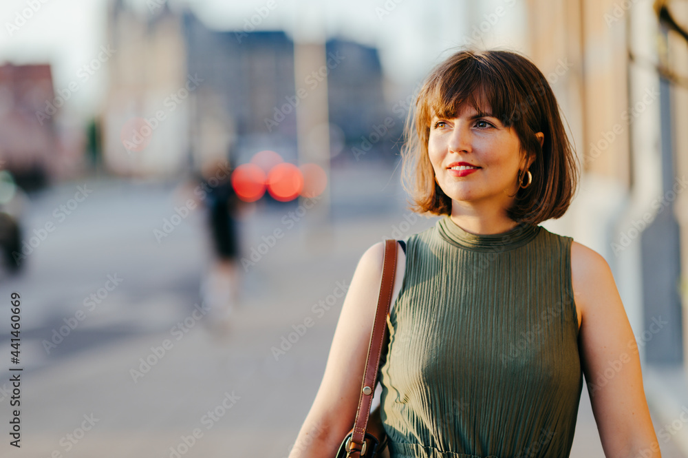 Woman walking in the city Woman walking in the city