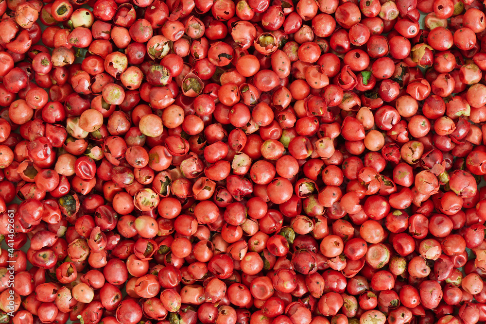 Pink peppercorn background, close up Pink peppercorn background, close up
