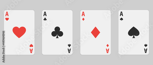 Set of four aces playing cards suits. Winning poker hand. Set of hearts, spades, clubs and diamonds ace. photo