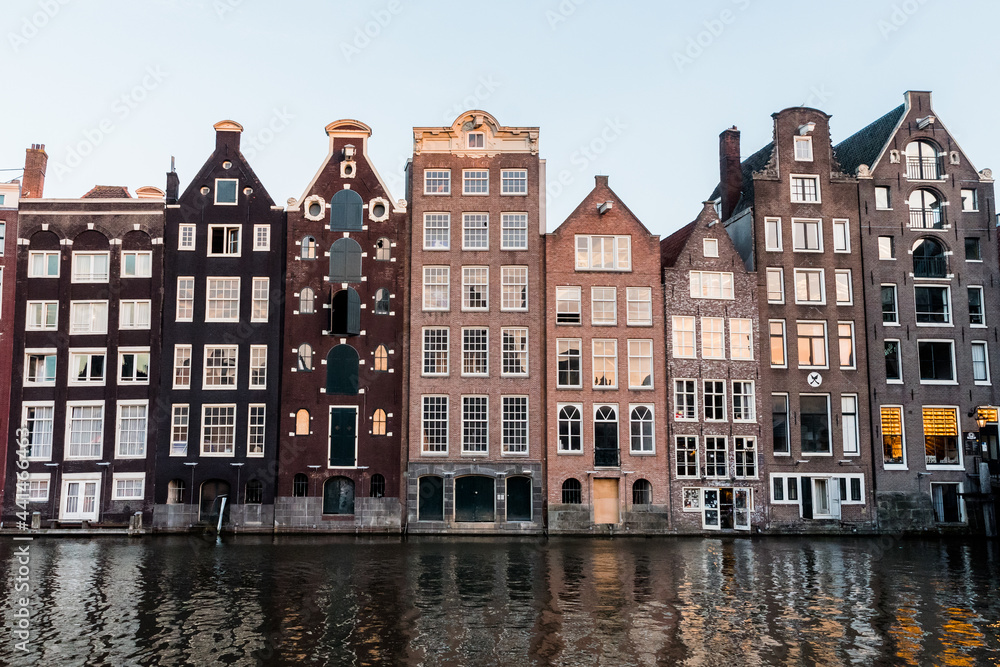 the contrast of amsterdam with its old and modern buildings