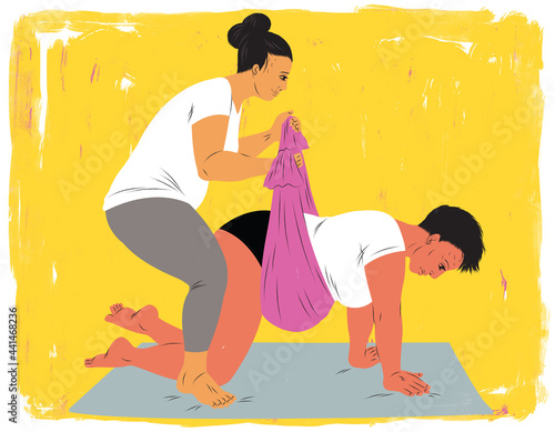 Doula helping a woman in labor using the rebozo or belly sifting technique photo