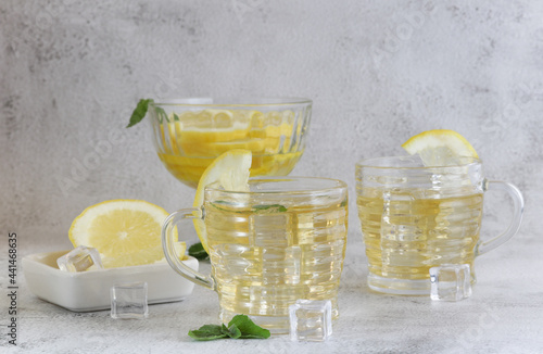 Cold green tea with lemon and mint.