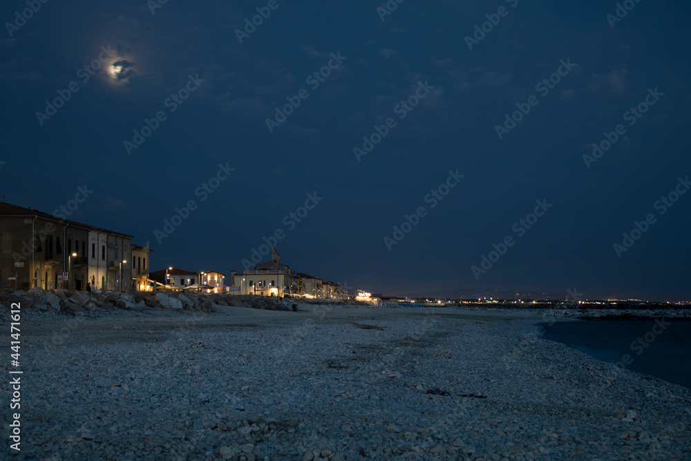 seaside  Italian town late in the evening after sunset in summer