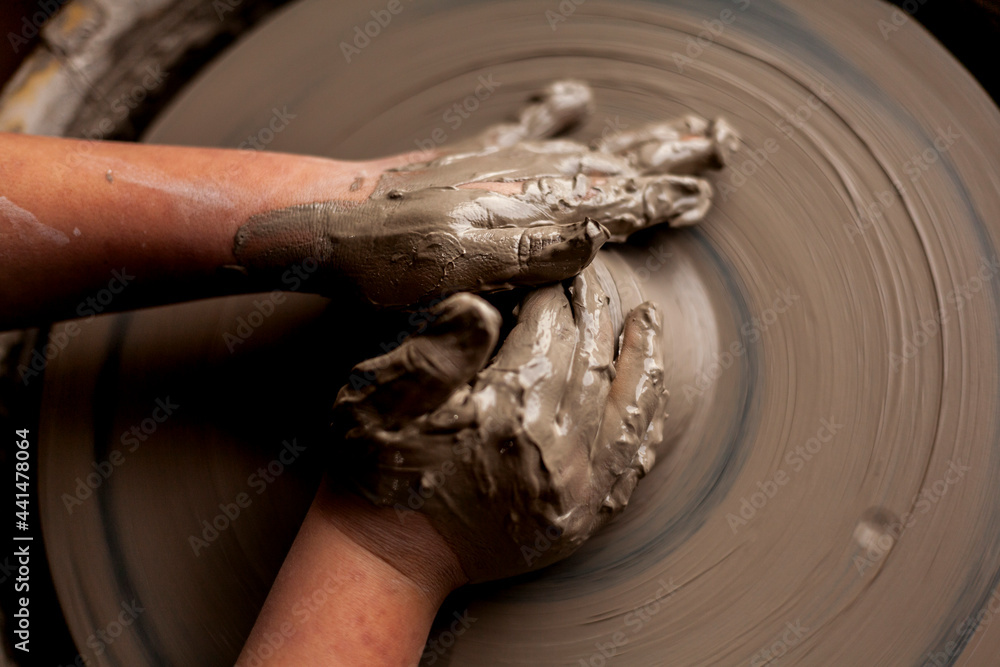 hands of child potter hands of child potter