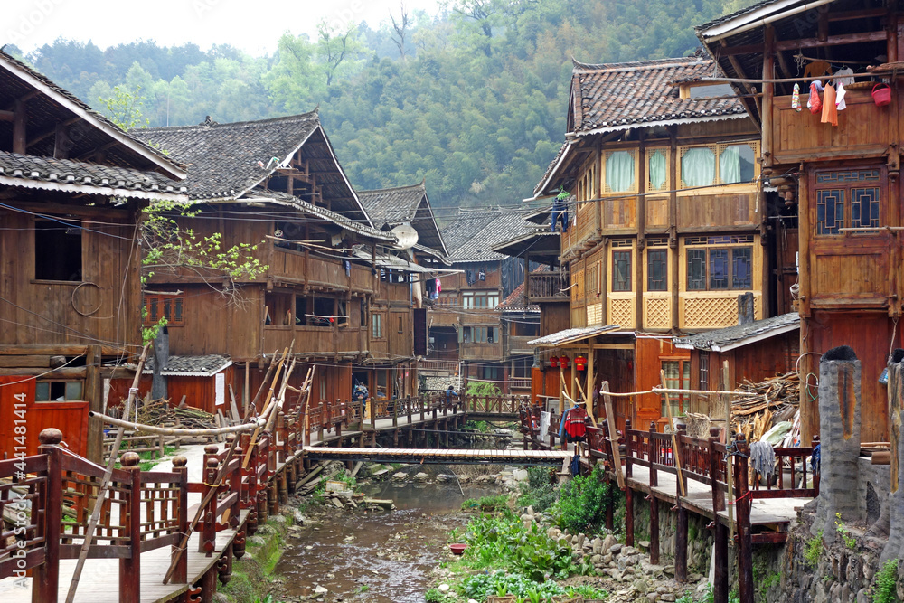 Obraz premium Yichang city, Hubei province, China.17 May 2014. China promoted the travelling spot at Long Jin Xi ancient village of Three gorges dam by let the staffs dressing a Chinese traditional vintage costume.