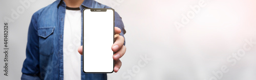 man holding cell phone in his hand with white background - easy modification