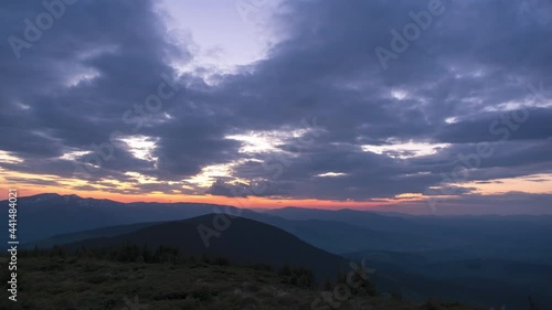 Beautiful colorful sunset in the carpathian mountains in summer.