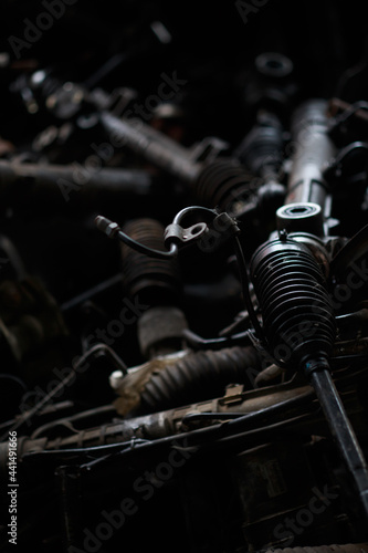 Car motor parts. Auto motor mechanic spare or automotive piece on dark backgr...