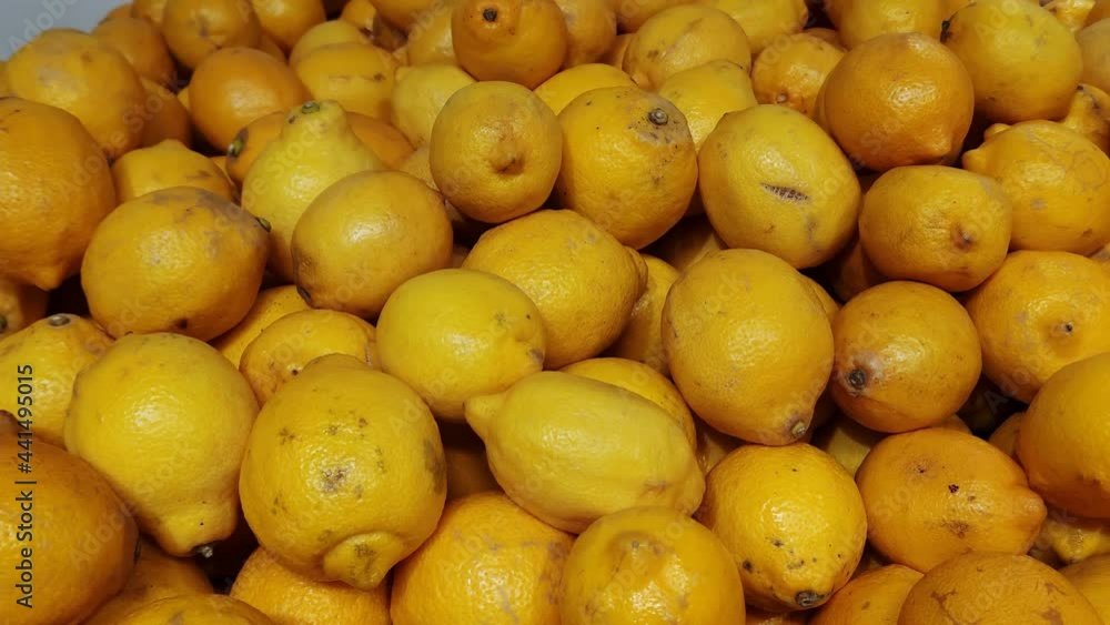 Stack of lemons in grocery store. Industry of selling products Stack of lemons in grocery store. Industry of selling products