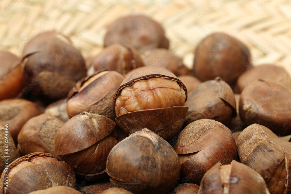 chinese food, peeled roasted chestnut on white background chinese food, peeled roasted chestnut on white background