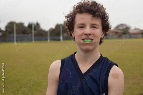 Portrait of Grassroots Footy player smiling with mouthguard photo