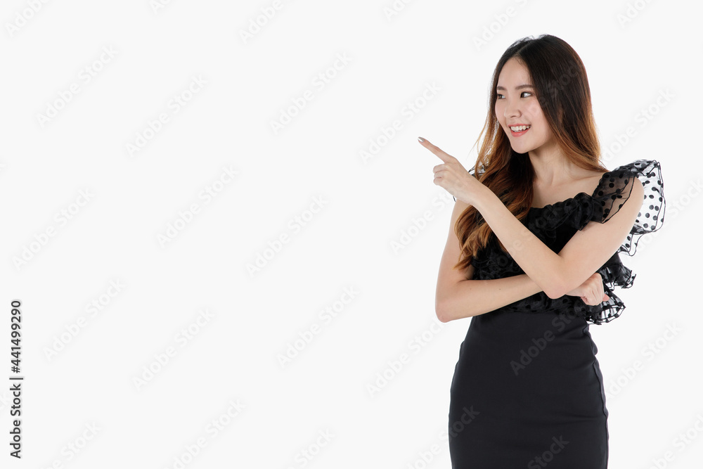 Portrait of young and cute self-confidence brunette long hair Asian girl with smile and friendly face. Charming girl pose with happy studio shot isolated on white background with finger pointing Portrait of young and cute self-confidence brunette long hair Asian girl with smile and friendly face. Charming girl pose with happy studio shot isolated on white background with finger pointing