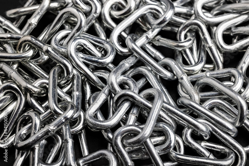Pile of metal chains can be used as a background