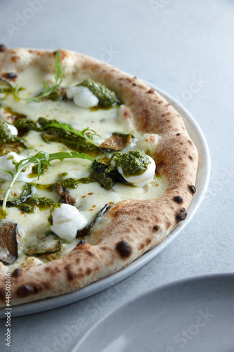 Fresh vegetarian pizza on plate photo