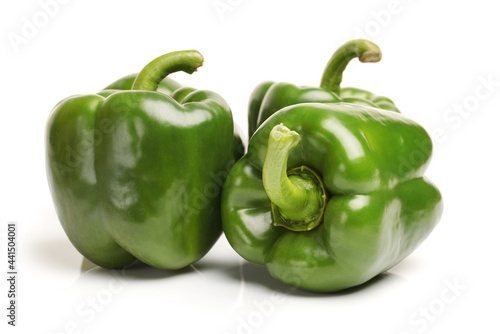 three peppers isolated on white