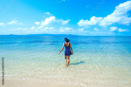 Fotografie woman in blue dress on the beach, at leela beach koh phangan ,suratthani,thailan
