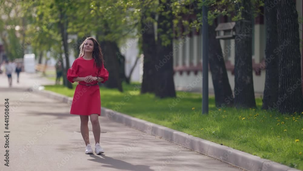 young woman is enjoying good weather and freedom at summer vacation young woman is enjoying good weather and freedom at summer vacation