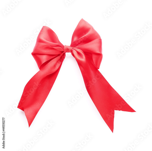 Beautiful red ribbon with bow on white background