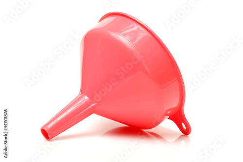 red plastic funnel isolated on a white background  photo