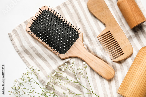 Hair comb and brush on white background