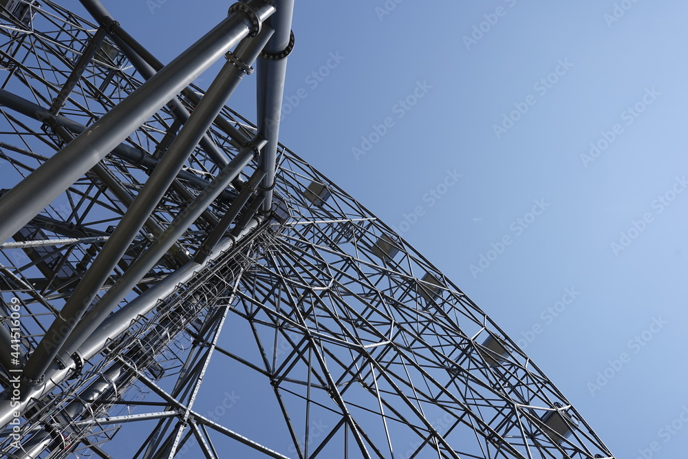 Ferris wheel design on a blue sky background