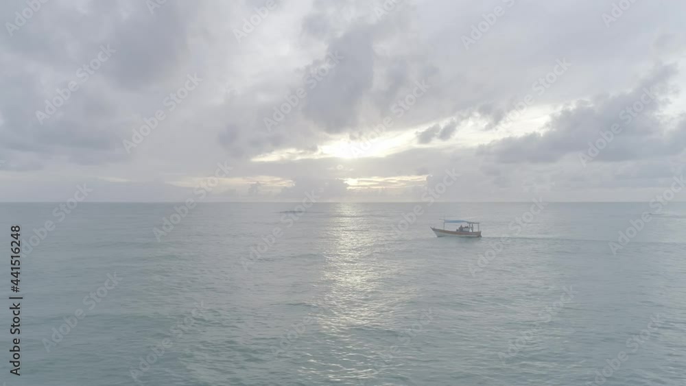 Aerial image of small lonely boat on the beach. 4K. Aerial image of small lonely boat on the beach. 4K.