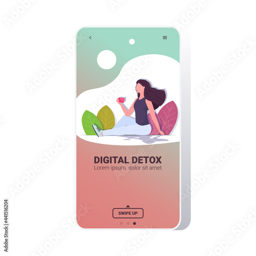 woman drinking coffee relaxing outdoors digital detox concept girl abandoning social networks