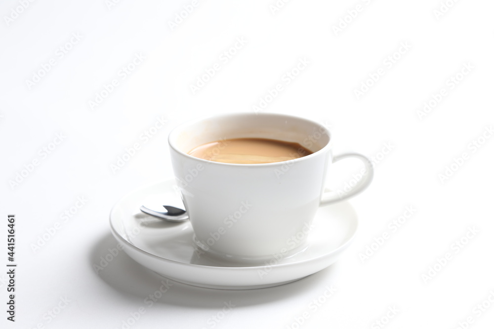 hot drink milk tea , milo , kopi coffee with milk in white cup and tea spoon and small plate in white background color beverage menu hot drink milk tea , milo , kopi coffee with milk in white cup and tea spoon and small plate in white background color beverage menu