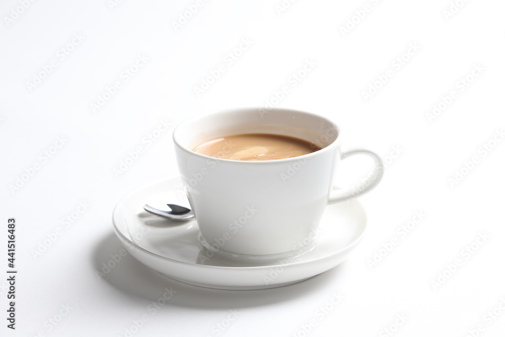 hot drink milk tea , milo , kopi coffee with milk in white cup and tea spoon and small plate in white background color beverage menu hot drink milk tea , milo , kopi coffee with milk in white cup and tea spoon and small plate in white background color beverage menu
