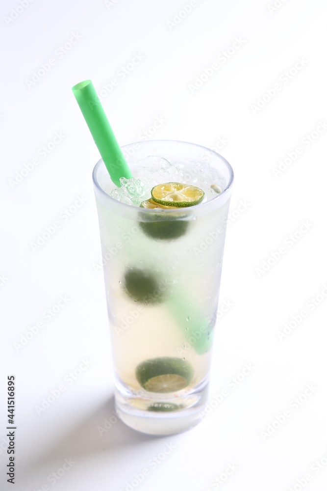 ice cold chilled fresh sour lime fruit honey drink in glass and green straw beverage menu in white background ice cold chilled fresh sour lime fruit honey drink in glass and green straw beverage menu in white background