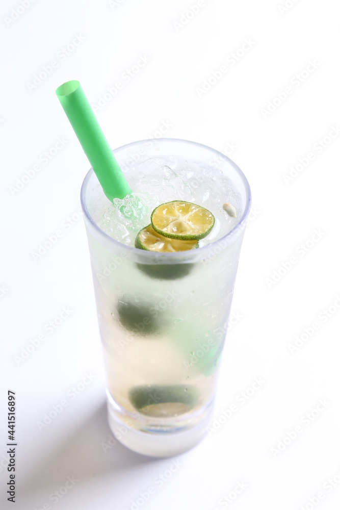 ice cold chilled fresh sour lime fruit honey drink in glass and green straw beverage menu in white background ice cold chilled fresh sour lime fruit honey drink in glass and green straw beverage menu in white background
