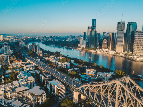 Fototapeta Naklejka Na Ścianę i Meble -  Sunrise aerial shot of Brisbane, the Story Bridge and the Brisbane River