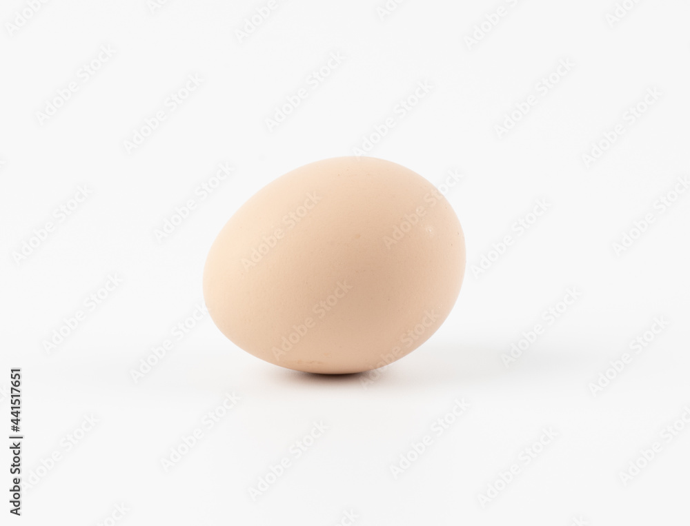 Single brown egg isolated from white background Single brown egg isolated from white background
