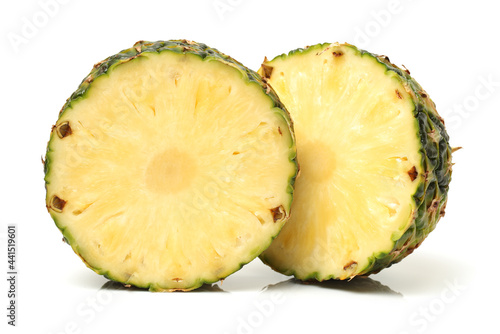 ripe slice pineapple on the white background 