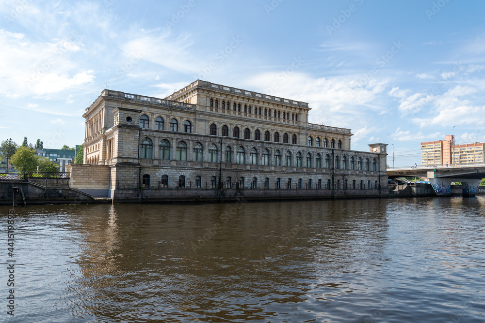 KALININGRAD, RUSSIA-JUNE 5, 2021: View of the Kaliningrad Museum of Fine Arts with a reflection in the Pregolya River.