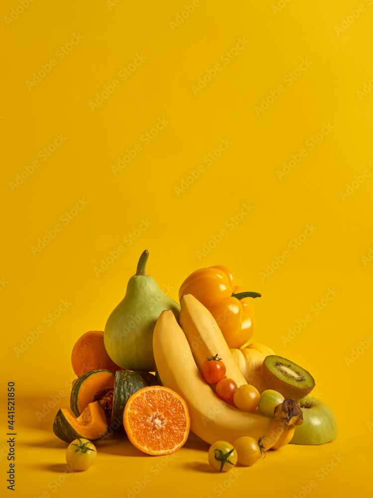 Fototapeta premium fresh vegetable and fruit on colourful background