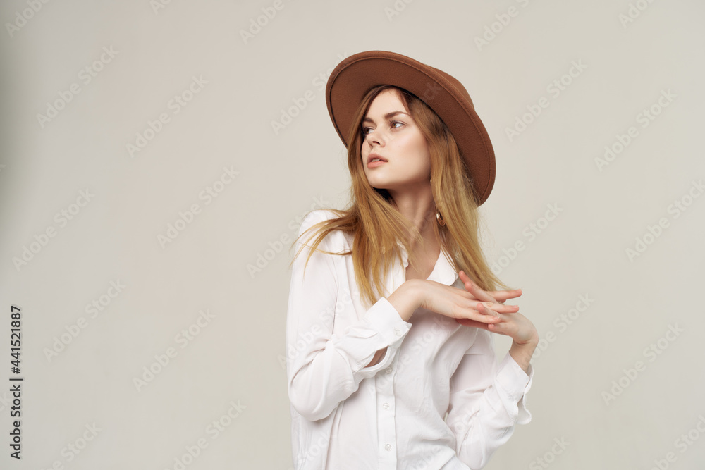 attractive woman in white shirt wearing hat decoration fashion modern style attractive woman in white shirt wearing hat decoration fashion modern style