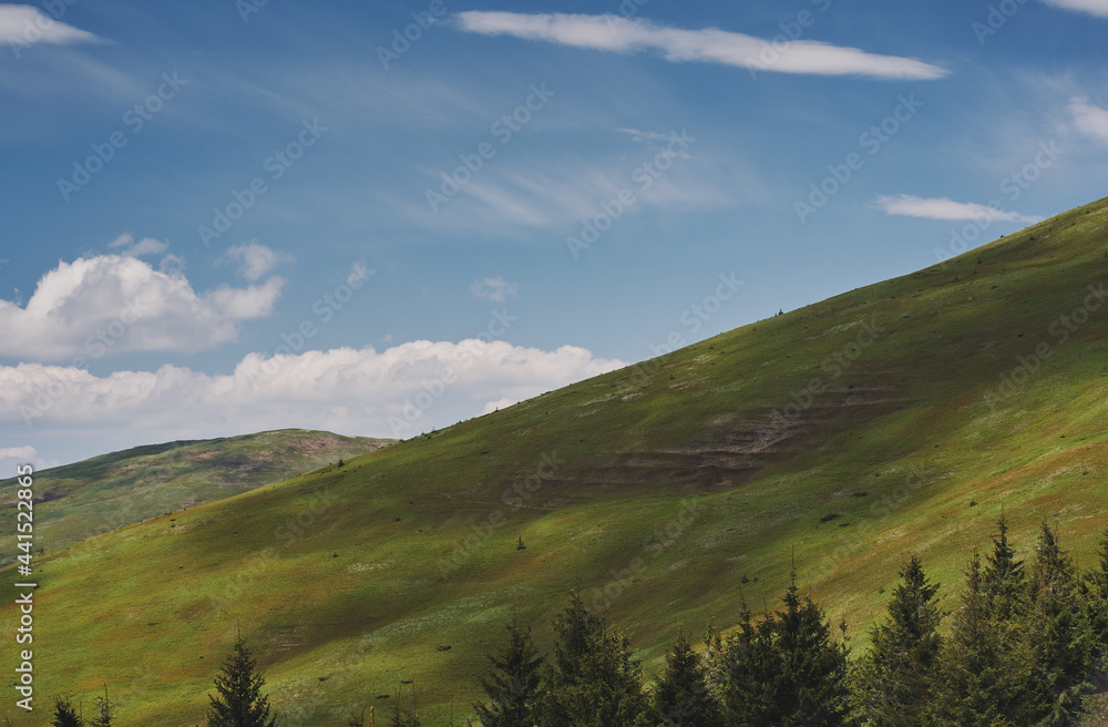 Clouds over the mountains. Sunny day in the mountains. Ukrainian Carpathian mountains. Svidovec ridge. Clouds over the mountains. Sunny day in the mountains. Ukrainian Carpathian mountains. Svidovec ridge.
