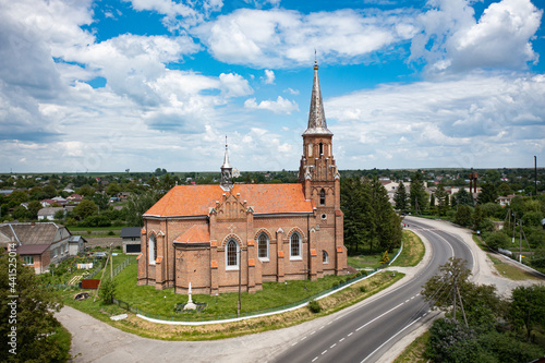 Neo-Gothic Catholic Church of the Sacred Heart of Jesus in Stoyaniv, Ukraine. Aerial view from drone