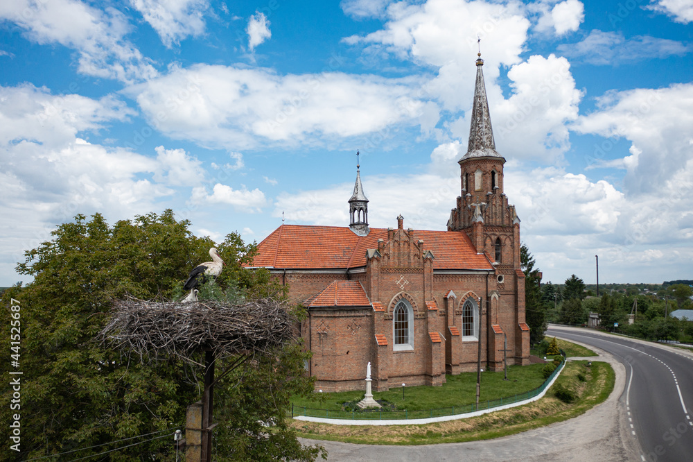 Obraz premium Neo-Gothic Catholic Church of the Sacred Heart of Jesus in Stoyaniv, Ukraine. Aerial view from drone
