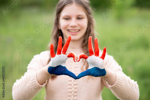Wallpaper Mural Croatia flag painted on child hands. Girl show heart shape gesture, focus on hands. Patriotic holiday. Independence Day, flag day, 25 June. Selective focus. Croatia Independence Day concept. Victory Torontodigital.ca