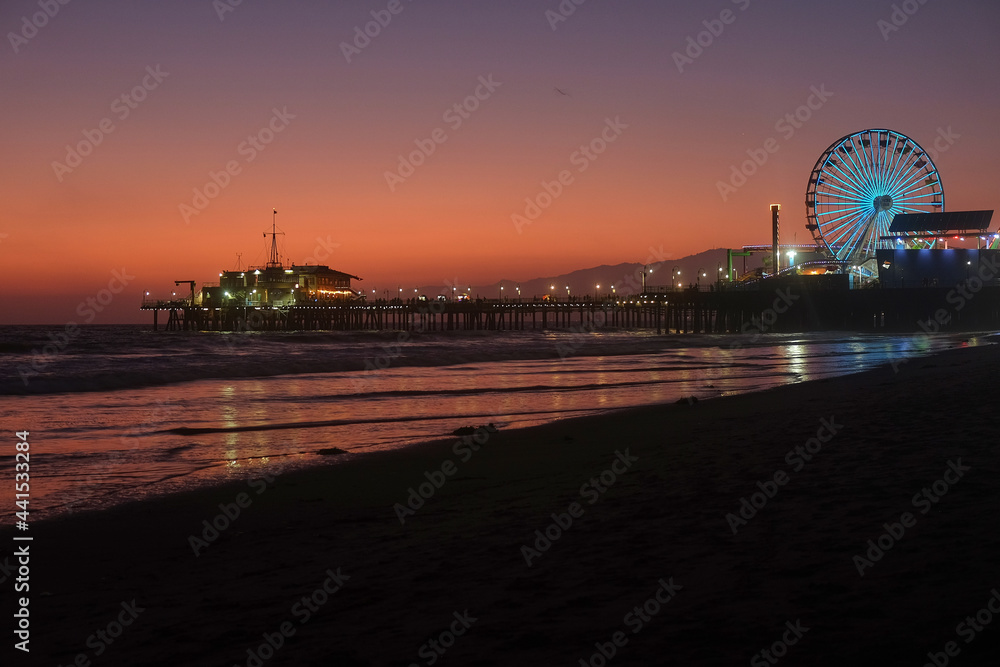 The Santa Monica Pier at sunset, Los Angeles, California.